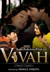 Vivah - Watch Shahid Kapoor & Amrita Rao in in Rajshri Productions' Vivah - A journey from engagement to marriage, directed by Sooraj R. Barjatya, music composed by Ravindra Jain. Vivah is the story of Poonam & Prem. Poonam (Amrita Rao) an orphaned middle-class girl who lives with her uncle (Alok Nath) and aunt (Seema Biswas). Poonam's chachi (aunt) has been unable to accept Poonam as her own child as she is more beautiful than chachis daughter, Rajni (Amrita Prakash). Poonam's simple and affectionate demeanor touches the heart of Bhagatji (Manoj Joshi) who takes her marriage proposal for Prem (Shahid Kapoor), son of renowned businessman Mr. Harishchandra (Anupam Kher). In spite of being brought up in the fast city life of New Delhi, Prem is rooted to the ground and has retained his familys traditional values and upbringing. 

Respecting his fathers wishes, Prem agrees to meet Poonam to get to know her better. What follows is a 'meeting' arranged by the two families. Prem and Poonam are suddenly in the midst of a situation they have never been in before. They discover their soul mates in each other and are engaged - to be married in six months. Prem and Poonam go through the most magical and romantic period of their lives. Six months fly by and just when everything is set for Prem and Poonam to get married... a crisis puts the love of Prem and Poonam through a trial by fire. 'Vivah' is a heart-warming tale of their unconditional love...