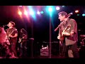 deacon frey performs the eagles' get over it at los angeles' roxy theater on april 11, 2008 with his father glenn frey backing.  the show was a benefit for the 