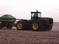 Seeding wheat with a JD 9400, 1850 no-till air seeder, and 787 cart.