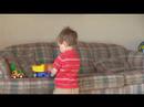 Martin plays quietly with his cars Martin plays quietly with his cars