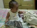 Neya is invading Mommy's bag