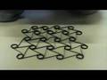 Chiral shape memory alloy antenna