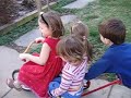Friends racing down the sidewalk