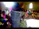 Children in Abeka sing a song of peace