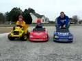 Grown Man Races Kids on Powerwheels