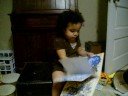 Angel reading and eating boogers