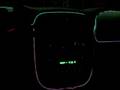 neon and subs in car