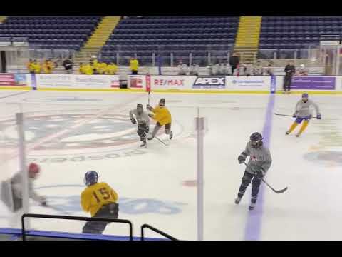 Kelowna Rockets (WHL) Rookie Camp Action: Liam (#11 yellow) picks up turned over puck in neutral zone, stick handles through defenders and puts a shot on net. (Sept 1, 2022)