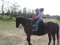 Lorelai and Gracie riding.avi