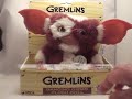 Available now at www.ImagineGate.com We have tons of movie collectibles and toys. Check us out. From the 1984 movie Gremlins. NECA brings you a Movie Accurate designed Gizmo. If you touch the musical plush Gizmo's belly he begins to sing the same song he did in Alex's bedroom the first night he came to the house. The song goes for about 10 seconds and while he sings he sways his head and body left and right. I remember when I was a kid and thought that having a Gizmo would be rad. So here he ...