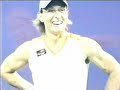 Martina Navratilova flexing her biceps