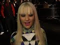 back to basics singer christina aguilera on the upcoming greatest hits album and still performing raunchy dance routines despite being a mum now.