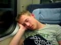 Benjamin sleeping in a train
