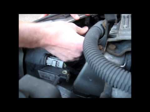 How to change the headlight bulbs on a Peugeot (shown on a Peugeot 206)