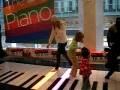 sophie on the giant piano in ny