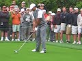 Tiger Woods smokes a drive