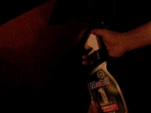 how to drain excess oil from a car