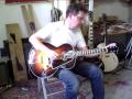 Daniel Slaman stringing up a new guitar for the first time !