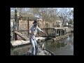 Rus Snyders catching a Clear Lake Bass on an AC Minnow