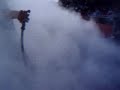 Older car doing burnout Older car doing burnout