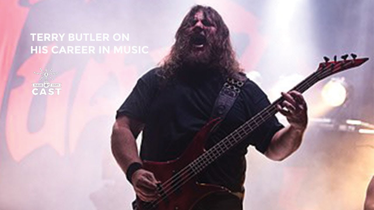 Cover image - Legendary bassist Terry Butler joins the podcast to talk all things metal. From playing in bands like Death and Six Feet Under, to currently performing with Massacre and Obituary, Terry...