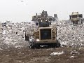 Bulldozers at landfill.