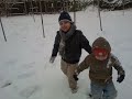 hamza & umar playing in snow.