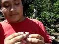 Lolo tocando un Silbato prehispanico