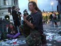 how to enlighten the riot police at a anti-bush protest