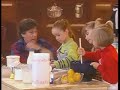 rolf zuckowski - in der weihnachtsb�ckerei 1988

in der weihnachtsb�ckerei 
gibt es manche leckerei. 
zwischen mehl und milch 
macht so mancher knilch 
eine riesengro�e kleckerei. 
in der weihnachtsb�ckerei, 
in der weihnachtsb�ckerei. 

wo ist das rezept geblieben 
von den pl�tzchen, die wir lieben? 
wer hat das rezept - verschleppt? 
na, dann m�ssen wir es packen, 
einfach frei nach schnauze backen. 
schmei�t den ofen an - oh ja - und ran. 

in der weihnachtsb�ckerei 
gibt es manche leckerei. 
zwischen mehl und milch 
macht so mancher knilch 
eine riesengro�e kleckerei. 
in der weihnachtsb�ckerei, 
in der weihnachtsb�ckerei.

brauchen wir nicht schokolade, 
honig, n�sse und sukkade 
und ein bi�chen zimt? 
das stimmt! 
butter, mehl und milch verr�hren, 
zwischendurch einmal probieren 
und dann kommt das ei: vorbei! 

in der weihnachtsb�ckerei 
gibt es manche leckerei. 
zwischen mehl und milch 
macht so mancher knilch 
eine riesengro�e kleckerei. 
in der weihnachtsb�ckerei, 
in der weihnachtsb�ckerei. 

in der weihnachtsb�ckerei 
gibt es manche leckerei. 
zwischen mehl und milch 
macht so mancher knilch 
eine riesengro�e kleckerei. 
in der weihnachtsb�ckerei, 
in der weihnachtsb�ckerei.

literal translating:
while baking for christmas
there are some treat.
between flour and milk
some boor makes 
an enormous mess.
during the christmas bakery,
during the christmas bakery.

where is the recipe of the cookies (biscuits)
that we love?
who has displaced the recipe ?
well, then we must seize it,
just bake by guess and by gosh.
turn on the oven - oh yes - and let's go.

while baking for christmas
there are some treat.
between flour and milk
some boor makes 
an enormous mess.
during the christmas bakery,
during the christmas bakery.

do we not need chocolate,
honey, nuts and candied peel
and a little cinnamon?
that's right!
mixing butter, flour and milk 
once in between taste it all
and then comes the egg: gone!

while baking for christmas
there are some treat.
between flour and milk
some boor makes 
an enormous mess.
during the christmas bakery,
during the christmas bakery.