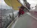 Innes Smith reefing the main-sail heading for Loopalu Innes Smith reefing the main-sail heading for Loopalu