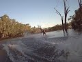 some mad puppy from cohuna doing tricks on hes wakeboard to a very nice stack