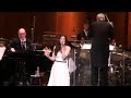 Idina Menzel performing Lady Gaga's Poker Face at Lincoln Center, accompanied by Marvin Hamlisch and the NY Philharmonic.