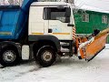 scoatere unui tir din zapada cu un john deer 7600