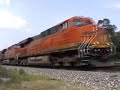 BN 8150 east meets BNSF 7583 west at Lockport, IL.