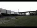 BN 8150 east meets BNSF 7583 west at Lockport, IL.