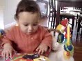 G2 in bouncer at 9 months