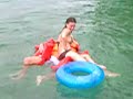 the kid with many lifejackets