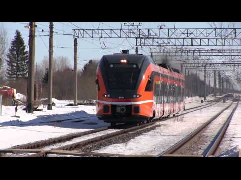 2404 - Stadler FLIRT DMU 2404 passing Raasiku station, Estonia, 16.03.2013.