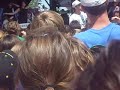 Gabe helps a girl in the crowd. Gabe helps a girl in the crowd.