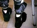 Marc Herremans putting on his legbraces