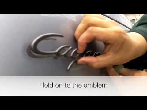 how to remove bmw trunk emblem