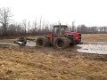 www.cedarlodgefarms.com For photos to go along with this video and others, please check out the photoblog on the website. This was December 1st 2008. Down to the last 5 acres to plow. The ground had been frozen solid for about 10 days previous so no plowing was possible. It warmed up and rained a few inches softening the ground enough to get the plows in. We were able to finish 100% of our plowing for the first time in a few years. It isn't actually all that muddy, just greasy on stiff ...