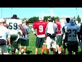 Eric Mangini and Brett Favre Discuss Plays During Practice Eric Mangini and Brett Favre Discuss Plays During Practice