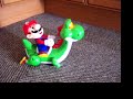 Yoshi and Mario light and sound motorised toy.