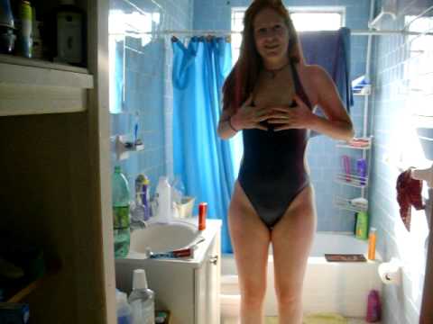 bathing suits women - Amazon Woman Tight Bathing Suit. Redhead. Pretty redhead girl.