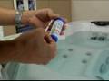 How To Maintain a Hot Tub : How to Use a Hot Tub Test Strip