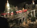Doug Wead creates a beautiful village in this unique indoor G scale model train layout. Beautiful scenery, bridges, elegant shopping and restaurants. Fog machine adds atmosphere. Featuring LGB trains and Pola, kit bashed buildings.