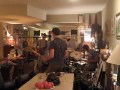 "The Earaches" playing "Stupid Harvard" at "The Moon and River Cafe"