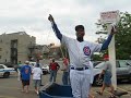 ronnie woo woo outside wrigley field after the cubs just beat the cardinals.